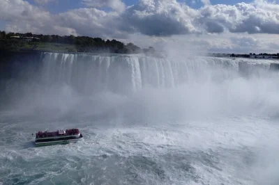 Experience niagara falls in winter with a local guide, hotel pickup, and the cave of the winds walk. see all three falls and enjoy small group comfort.