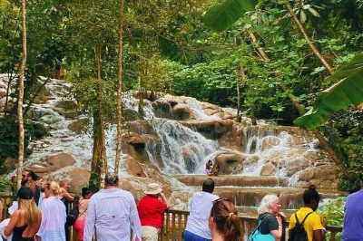 Experience jamaica’s dunn’s river falls and blue hole on a guided day trip from falmouth. includes hotel pickup, entry fees, and time for local lunch.