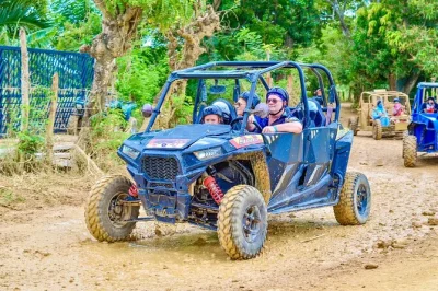Explore punta cana em um buggy 4x4 passando por coqueirais e trilhas rurais até a praia de macao. inclui água mineral, traslado e guia local simpático.