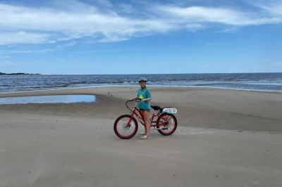 Ride electric bikes from amelia island to big talbot with a self-guided route, smart helmets for group chat, and local tips. includes bike, helmet, and water.