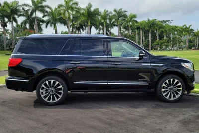 Private transfer from san juan airport or cruise port to any puerto rico town. bilingual local driver, luxury suv, pickup at baggage claim, bottled water included.
