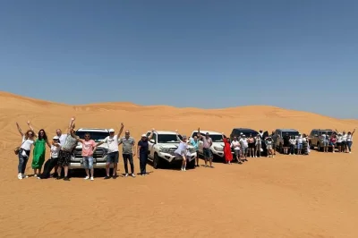 Experience an abu dhabi desert safari with dune bashing, camel ride, sandboarding, and bbq dinner. includes hotel pickup, local guide, and live entertainment.