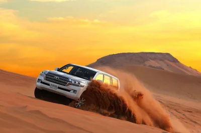 Experience dubai’s desert with dune bashing, sunset views, camel rides, and a bbq dinner. includes pickup, local guide, and live entertainment for a memorable evening.