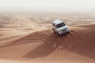 Experience dubai’s desert with 4x4 dune bashing, camel riding, sandboarding, and a bbq dinner. includes hotel pickup, local guide, and cultural activities.
