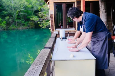 Experience a hands-on tuscan cooking class near florence, with fire-cooked dishes, local wine pairings, and dinner in the countryside. includes pickup & guide.