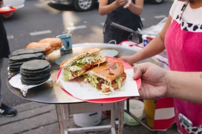 Explore mexico city's cuauhtémoc neighborhood on a street food tour with a local guide, generous vendor tips, and authentic mexican snacks included.