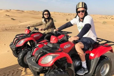 Experience dubai’s desert with quad biking, camel trekking, and sandboarding. includes hotel pickup, local guide, and bottled water for a seamless adventure.