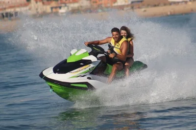 Experience a 20-minute jet ski ride in vilamoura, algarve, with safety briefing, local staff, and all equipment included. suitable for beginners and families.