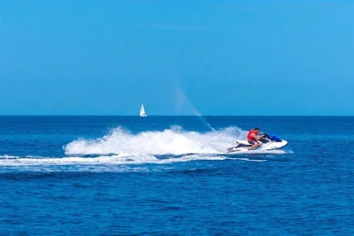 Ride a jet ski from dubrovnik to elaphite islands, swim in the blue cave, see city walls from the sea, with local guide and all equipment included.