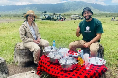 Experience a full-day ngorongoro crater safari from arusha, spot the big 5, enjoy a lakeside picnic, and travel with a local guide. includes lunch and drinks.
