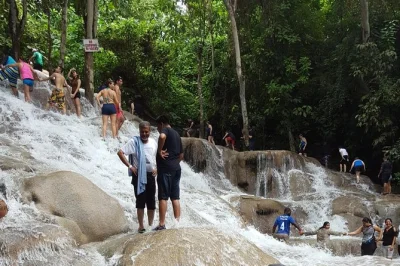 Experience dunn's river falls from ocho rios with a local guide, climb the famous cascades, relax on the beach, and enjoy flexible pickup options.