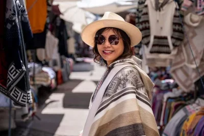 Explore otavalo’s vibrant market, meet kichwa artisans, and walk to peguche waterfall on a private day trip from quito with local guide and transport included.