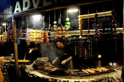 Private dubai desert safari with hotel pickup, sunset dune bashing, camel ride, vip camp setup, live shows, and international bbq dinner. includes private guide.