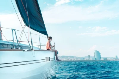 Sail barcelona’s coast on a small group yacht cruise, enjoy chef-made pinchos, open bar, and city views. includes drinks, snacks, and professional skipper.
