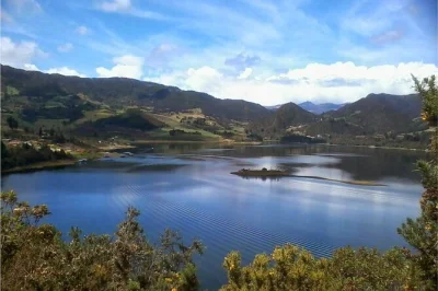 Fuel up on local breakfast, hike neusa reservoir’s trails, and share lunch by the lake—includes transport from bogota, english-speaking guide, and all meals.