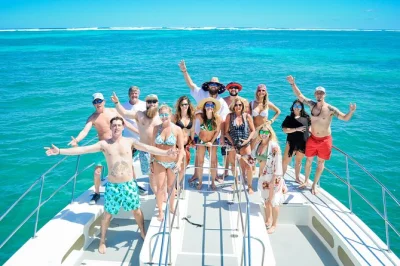 Feel the breeze on a private catamaran cruise in punta cana with open bar, snorkeling, and a natural pool stop. includes hotel pickup for easy booking.