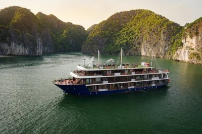 Book a 2-day lan ha bay cruise with kayaking, cave visits, and fresh seafood. includes overnight cabin, local guide, and roundtrip from hanoi old quarter.