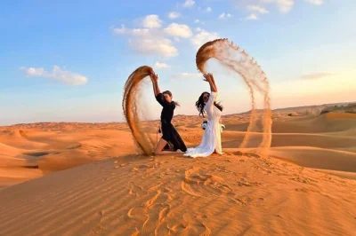 Feel the thrill of dune bashing and sandboarding in dubai’s lahbab desert, enjoy a camel ride, live shows, and bbq dinner. includes hotel pickup & premium camp.
