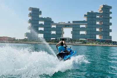 Feel the rush on a 90-minute dubai jetski tour—ride past palm jumeirah, burj al arab, atlantis & dubai marina skyline. includes safety gear & water.
