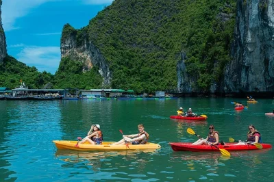 Feel the rhythm of ha long bay on a premium day cruise with buffet lunch, kayaking at luon cave, and hotel pickup from hanoi’s old quarter included.
