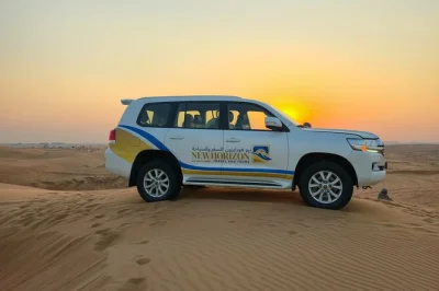 Feel the thrill of dubai’s red dunes with dune buggies, camel rides, live shows & a 5-star bbq dinner. includes hotel pickup for a seamless desert evening.