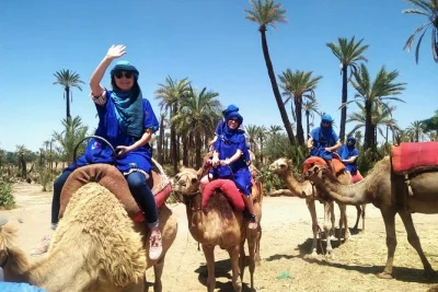 Step into marrakech’s palmeraie for a camel ride, guided by locals, with traditional saharan attire and fresh mint tea included. hotel pickup & drop-off.