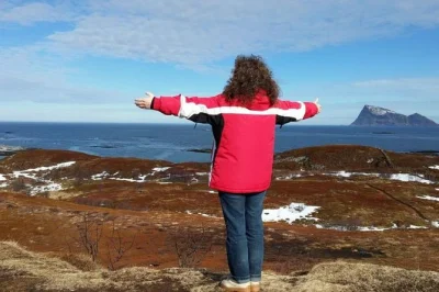 Breathe the arctic air on a tromso fjord day trip—see wildlife, snow peaks, and wild coastlines with a local guide. includes pickup, thermal suits, and hot drinks.