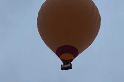 Float above marrakech’s atlas foothills by hot air balloon, share a berber breakfast in a desert tent, and ride camels among palms. includes hotel pickup.