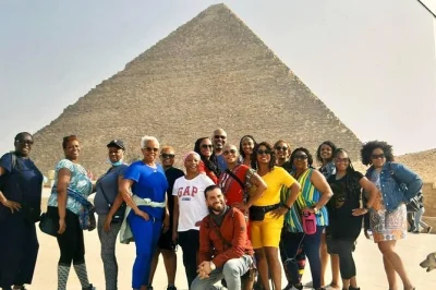 Stand face-to-face with the giza pyramids and sphinx on a private day trip from cairo. includes hotel pickup, egyptologist guide, camel ride, and local lunch.