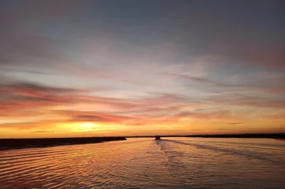 Watch the colors shift over ria formosa from a small boat, spot wild birds, and hear local stories on this 1-hour faro sunset cruise. includes live guide commentary.