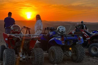 Feel the agafay desert’s wind on a quad bike, ride camels in nomadic dress, and share a berber dinner under the stars. includes marrakesh hotel pickup.