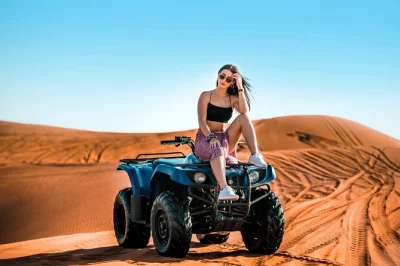 Feel the rush of dubai’s red dunes with dune bashing, quad biking, camel rides, and a bbq dinner. includes hotel pickup and live entertainment for a full desert evening.