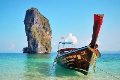 Set out from krabi on a private long-tail boat tour to four islands, snorkel clear waters, walk the sandbar at thaleh waek, and explore phra nang cave. includes hotel pickup.