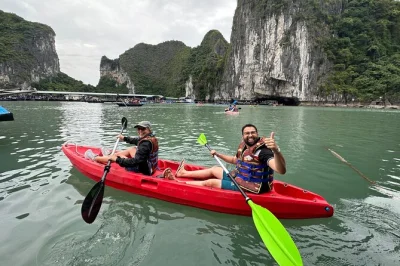 Feel the sea breeze on a halong bay cruise from hanoi, kayak luon cave, hike titop island, and share a local lunch—includes hotel pickup and english-speaking guide.