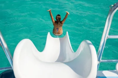 Feel the salt air on a full day turks & caicos cruise—snorkel coral reefs, meet rock iguanas, hunt for conch, and enjoy a fresh bbq lunch with drinks. includes hotel pickup.