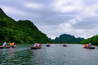 Experience bai dinh pagoda, climb mua cave, and enjoy a trang an boat trip. includes lunch, guide, and transfers from hanoi old quarter.