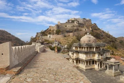 Private one-way transfer from jodhpur to udaipur, stopping at ranakpur jain temple and kumbhalgarh fort. includes air-conditioned car and local insights.