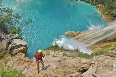 Feel the rush of rappelling beside turquoise falls in huasteca potosina, then leap from micos waterfall’s cliffs. includes hotel pickup, lunch, and local guides.