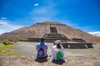 Feel ancient teotihuacán up close—walk the pyramids, bike the valley, taste pulque, and share a local lunch. includes hotel pickup and expert guide.