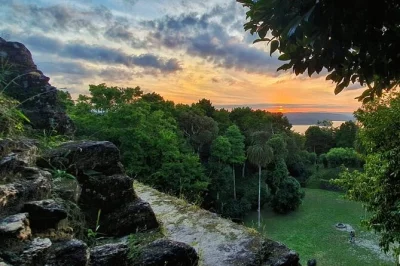 Private yaxha sunset tour with temple climbs, wildlife spotting, and local lunch. includes transport from flores or el remate. book your adventure now.