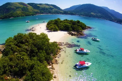 Nagez dans les eaux cristallines de la blue lagoon à ilha grande, faites du snorkeling parmi les poissons, visitez la vieille église de santana et déjeunez sur la plage. guide local et prise en cha
