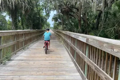 Feel the breeze on an amelia island electric bike tour—cross the george crady bridge, ride trails to big talbot beach, and enjoy a local stop. includes helmet & bike.