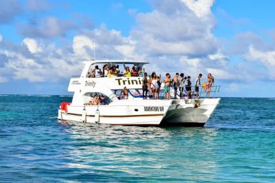 Feel the energy of punta cana on a hip hop party boat with live djs, open bar, swimming stops, and sand bar dancing. includes pickup and fresh fruit snacks.