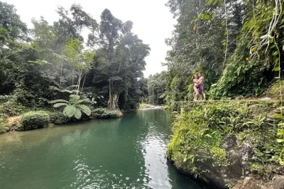 Wake up your senses on a half-day rainforest hike from san juan, with river swimming, rope swings, and puerto rican street snacks—includes transport & guide.