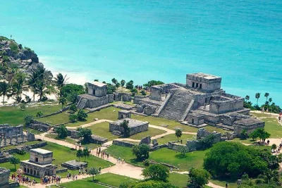 Scopri le antiche rovine di tulum affacciate sul mar dei caraibi, osserva le iguane selvatiche e rilassati sulla sabbia bianca—tour privato con guida locale, incluso transfer e pranzo.