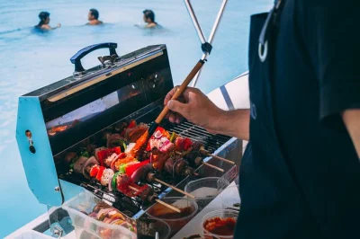 Savor grilled skewers on a private bacalar boat tour, swimming in quiet lagoons, cold drinks in hand. includes bbq lunch, beers, and a friendly local guide.