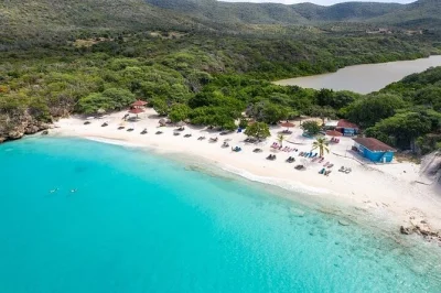 Feel the real curacao with a private island tour—snorkel with turtles, spot wild flamingos, taste blue curacao, and relax at hidden beaches. includes hotel pickup.