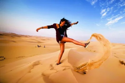 Feel the thrill of dubai’s red dunes with dune bashing, camel rides, sandboarding, and a bbq dinner at a desert camp. includes hotel pickup and live shows.