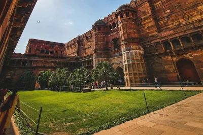 Wake before sunrise in bangalore, fly to delhi, and journey by car to the taj mahal & agra fort. includes hotel pickup, flights, lunch, and a private guide.
