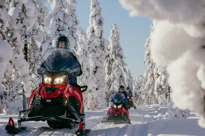Feel the crunch of snow under your boots on a guided snowmobile safari through rovaniemi’s arctic forests, with thermal gear and hotel pickup included.